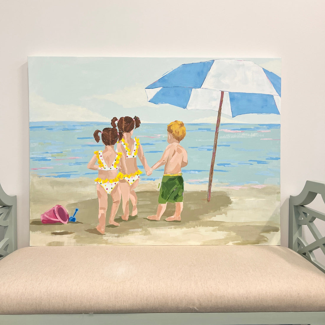 Artist Kristin Cooney explains the process of a commissioned custom painting of triplets on the beach
