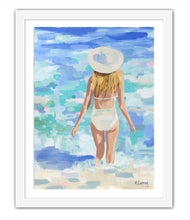 Load image into Gallery viewer, Kristin Cooney&#39;s fine art giclee print of a pretty woman in a white bathing suit at the beach, walking into the waves, has a feminine palm beach vibe and is the perfect art to add some fun and elegance any home decor, interior design.  
