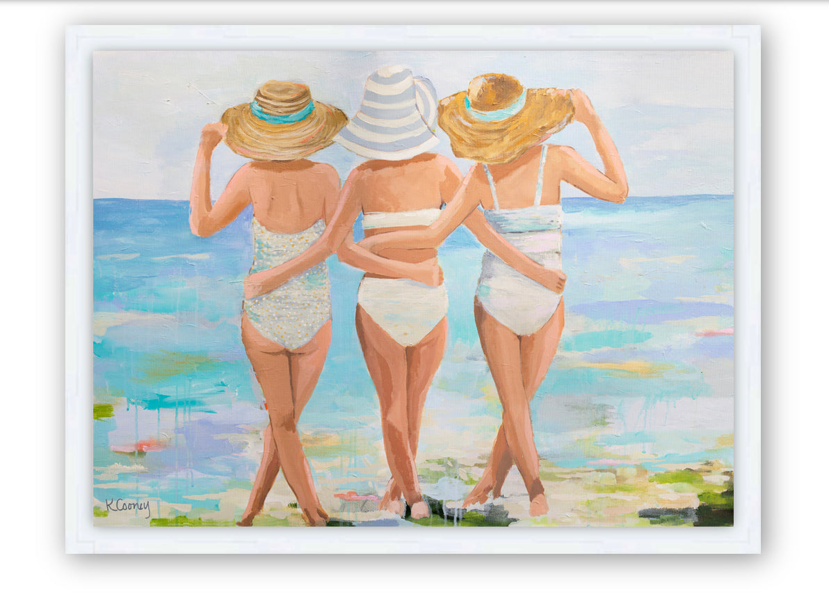 An artwork print featuring three women in swimsuits and straw hats, viewed from behind, walking on a beach with a stylized, painterly approach in pastel colors. Created from an original painting by Kristin Cooney