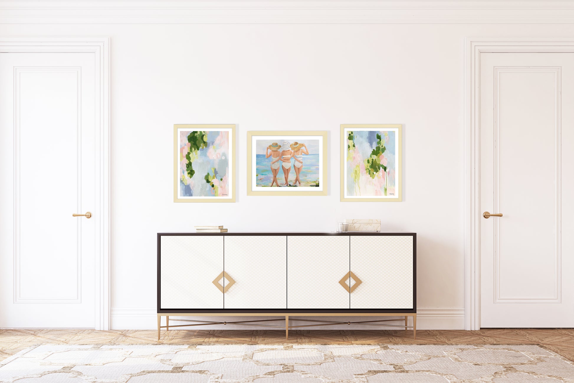 An artwork print featuring three women in swimsuits and straw hats, viewed from behind, walking on a beach with a stylized, painterly approach in pastel colors. Created from an original painting by Kristin Cooney