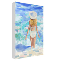 Load image into Gallery viewer, Kristin Cooney&#39;s fine art giclee print titled GWYNETH of a pretty woman in a white bathing suit at the beach, walking into the waves, has a feminine palm beach vibe and is the perfect art to add some fun and elegance any home decor, interior design.  A nod to vintage glamour with free U.S. shipping and multiple size options. Created from an original painting by Kristin Cooney.
