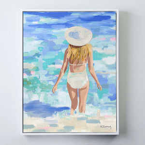 Kristin Cooney's fine art giclee print titled GWYNETH of a pretty woman in a white bathing suit at the beach, walking into the waves, has a feminine palm beach vibe and is the perfect art to add some fun and elegance any home decor, interior design.  A nod to vintage glamour with free U.S. shipping and multiple size options. Created from an original painting by Kristin Cooney.