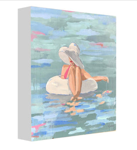 Art print titled PRISCILLA from the BATHING BEAUTIES COLLECTION by Kristin Cooney, inspired by 1950's beach fashion and femininity. The PRISCILLA fine art print by Kristin Cooney—featuring a glamorous woman in a pink swimsuit and sunhat, gracefully lounging in a pool float. A nod to vintage glamour with free U.S. shipping and multiple size options. Created from an original painting by Kristin Cooney.
