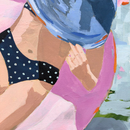 Kristin Cooney's fine art giclee print of a pretty woman in a bikini floating in an innertube in a beautiful water scene, has a feminine palm beach vibe and is the perfect art to add some fun and elegance any home decor, interior design.  Printed on Archival Matte Paper Metallic Bamboo frame or natural wood frame.