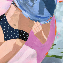 Load image into Gallery viewer, Kristin Cooney&#39;s fine art giclee print of a pretty woman in a bikini floating in an innertube in a beautiful water scene, has a feminine palm beach vibe and is the perfect art to add some fun and elegance any home decor, interior design.  Printed on Archival Matte Paper Metallic Bamboo frame or natural wood frame.
