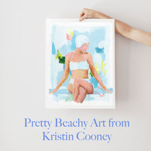 Load image into Gallery viewer, Kristin Cooney&#39;s fine art print from her Bathing Beauties collection, inspired by 1950&#39;s beach fashion and femininity. Woman in blue bikini and swim cap, synchronized swimmer in pool. Elegant nostalgic fashion art to add beauty to any home decor, interior design, beach house art, spa art, female figure art, bedroom art
