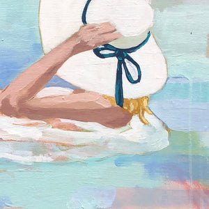 Kristin Cooney's fine art print from her Bathing Beauties collection, inspired by 1950's beach fashion and femininity. Woman in bikini and sun hat, floating in inner tube in pool. Elegant nostalgic fashion art to add beauty to any home decor, interior design, beach house art, spa art, female figure art, bedroom art
