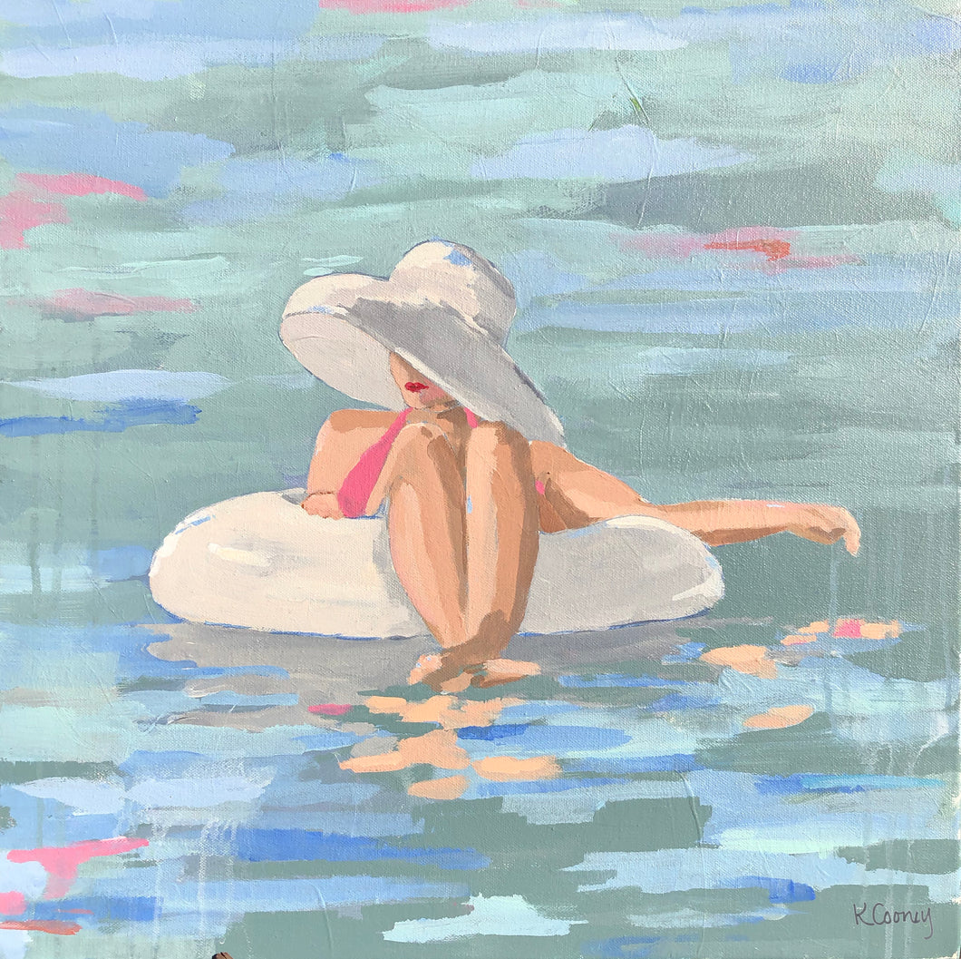 Kristin Cooney's fine art print from her Bathing Beauties collection, inspired by 1950's beach fashion and femininity. The PRISCILLA fine art print by Kristin Cooney—featuring a glamorous woman in a pink swimsuit and sunhat, gracefully lounging in a pool float. A nod to vintage glamour with free U.S. shipping and multiple size options. Created from an original painting by Kristin Cooney.